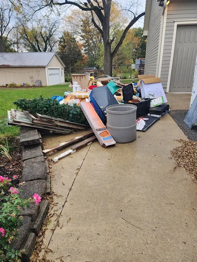 Dumpster being loaded with debris for Residential Dumpster Rental in Abingdon